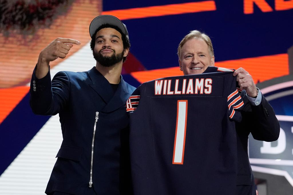 Caleb Williams and Roger Goodell celebrating Williams' first overall pick in the NFL draft by the Chicago Bears