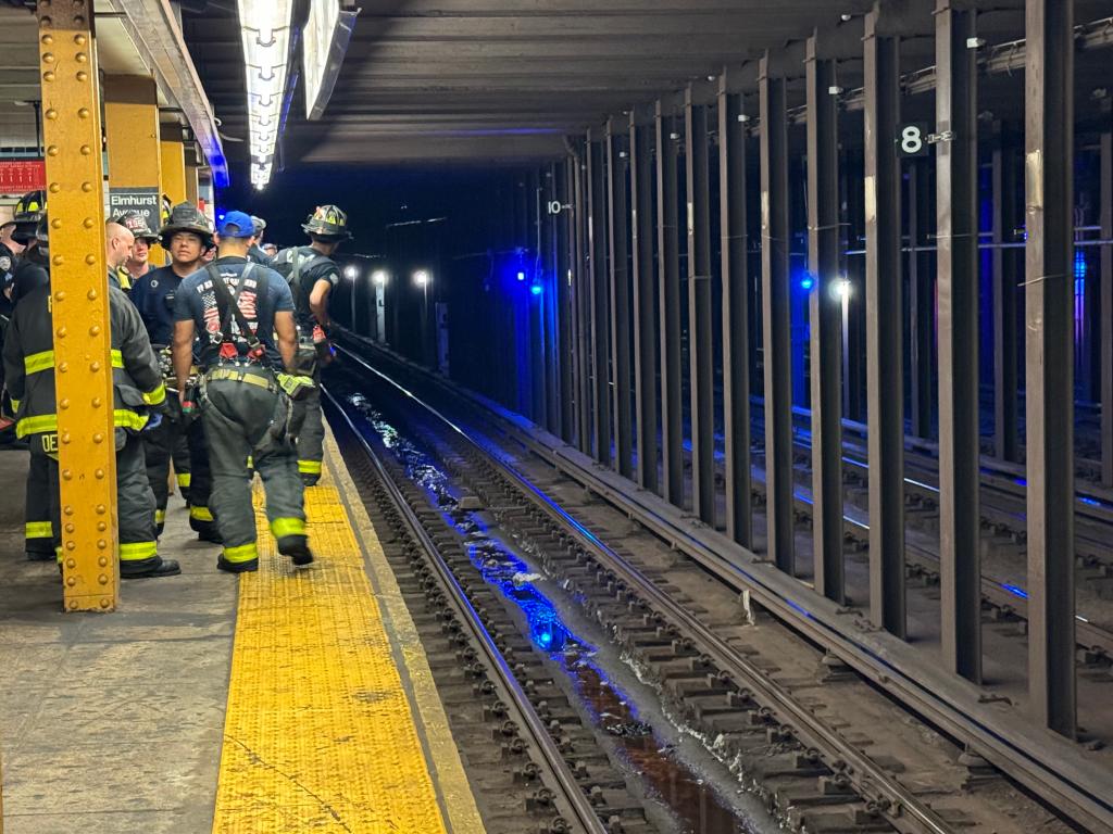 First responders at scene of person struck by subway train.