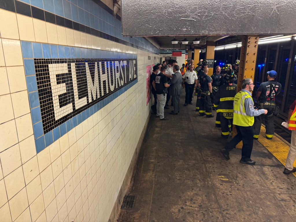 First responders at the scene of a fatal subway strike at the Elmhurst Ave. station in Queens. 