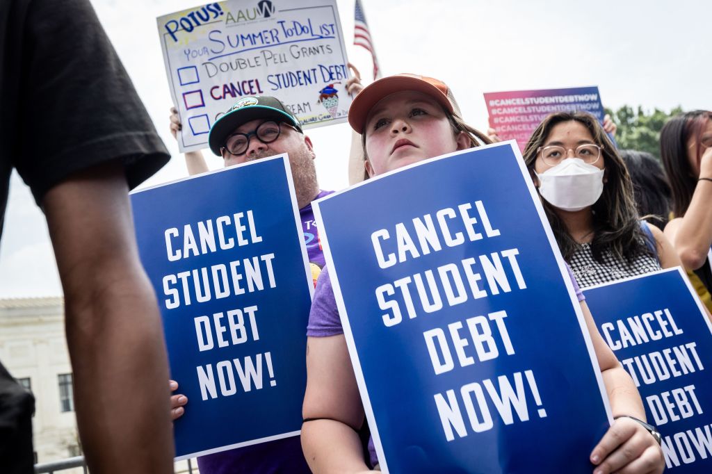 Students protest the Supreme Court's ruling against President Joe Biden's student-debt relief program.  The opinion does not prohibit student loan forgiveness but finds that the law used to authorize the program was beyond the scope of what Congress intended.