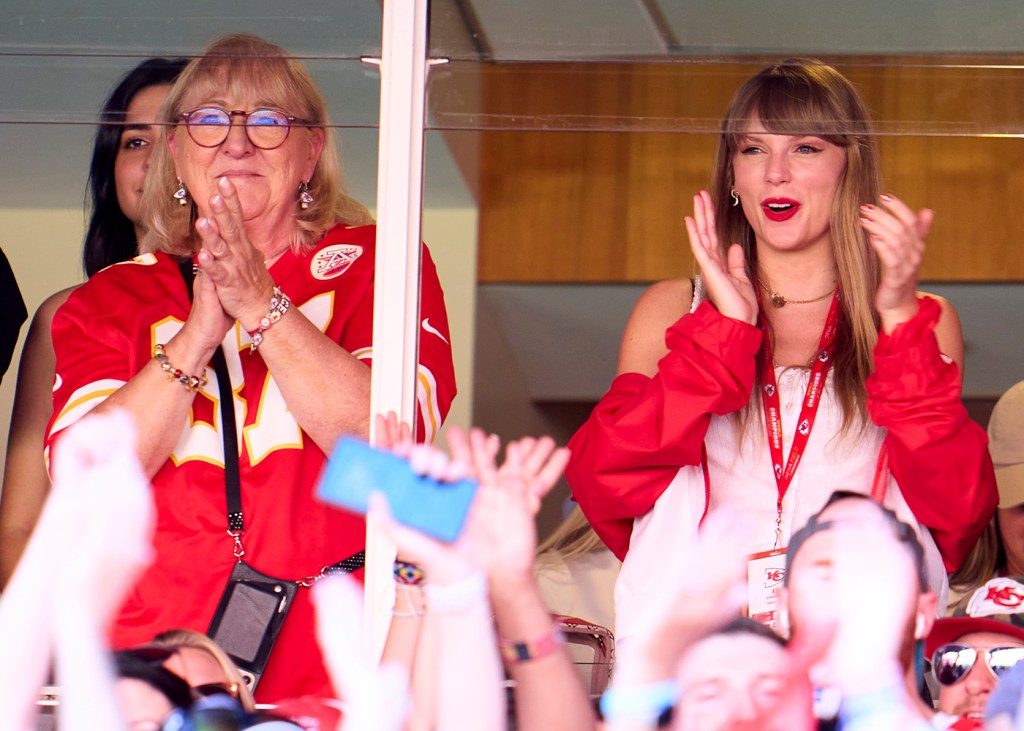 Donna Kelce (L) and Taylor Swift (R) cheer from a suite as the Kansas City Chiefs play the Chicago Bears at GEHA Field at Arrowhead Stadium on September 24, 2023 in Kansas City, Missouri.  