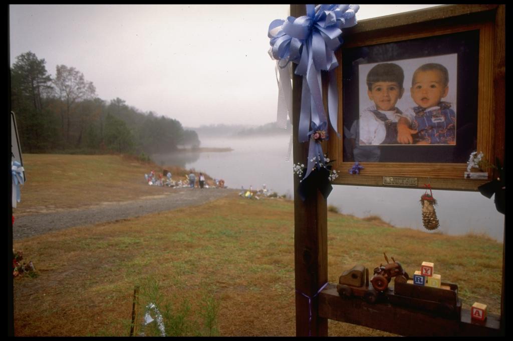 A picture of a shrine that was erected near the lake, in memory of the Smith children.