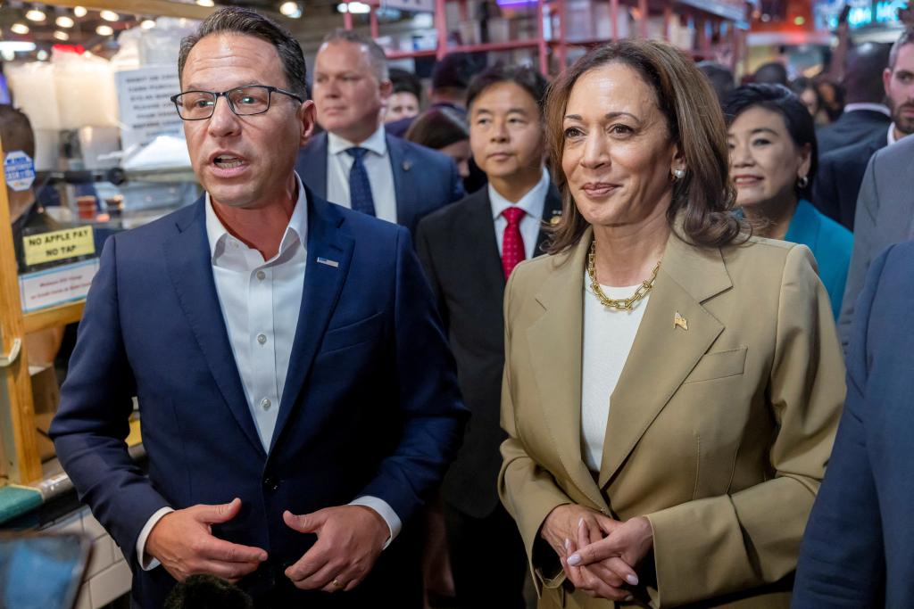 U.S. Vice President Kamala Harris and Pennsylvania Governor Josh Shapiro visit the Reading Terminal Market in Philadelphia, Pennsylvania, U.S., July 13, 2024. 