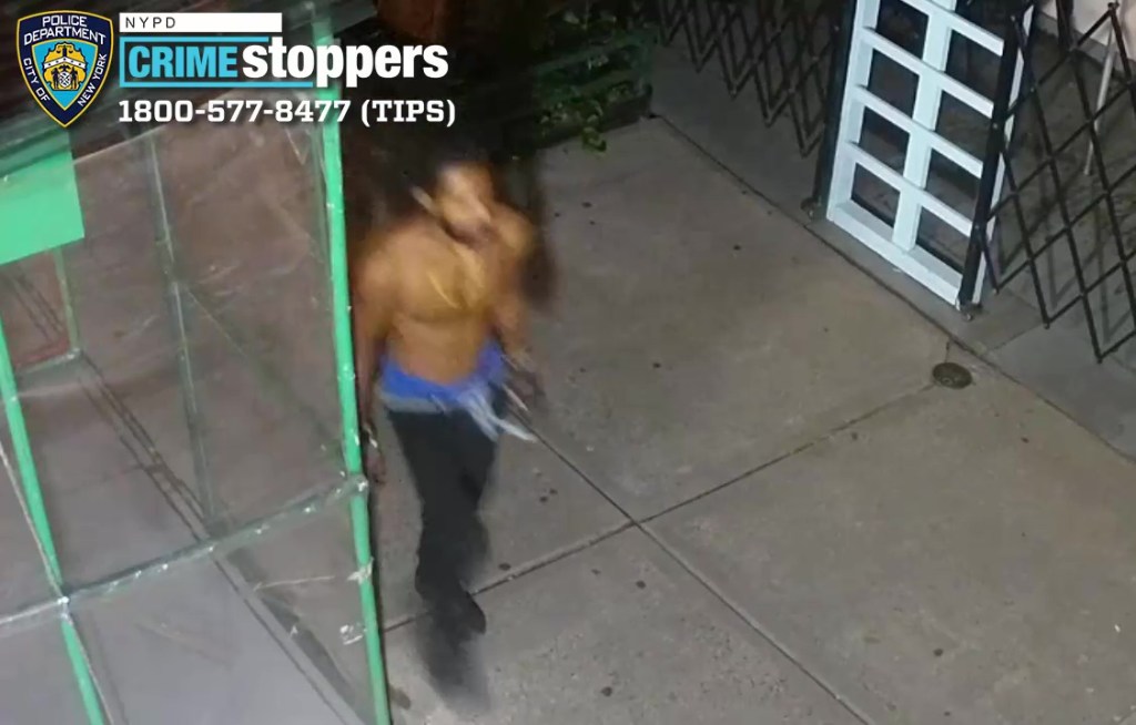 The video shows the suspect shirtless walking in the area of the crime.