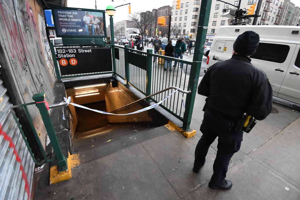 NYPD standing outside the subway entrance, responding to a shooting inside the Grand Councourse/E 182 St subway station, Bronx,