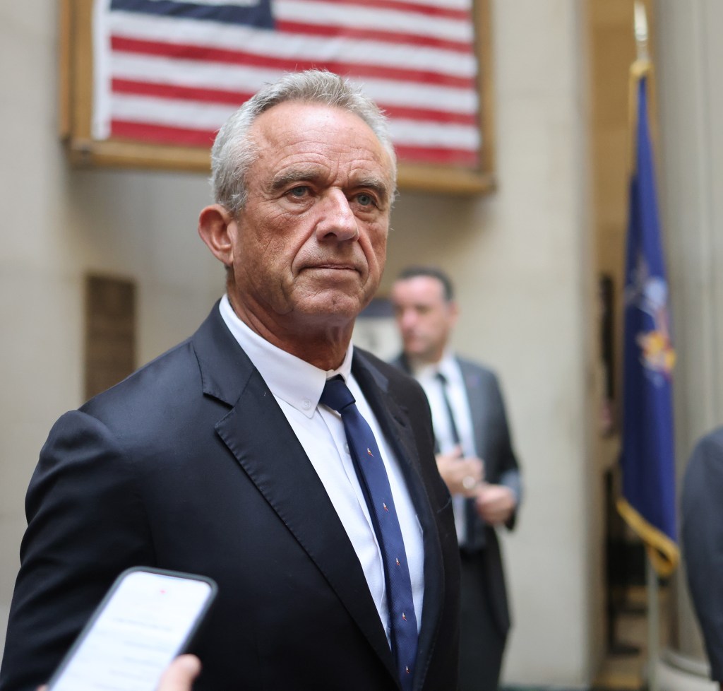 Robert F. Kennedy Jr. walking in the hallway of the Supreme Courthouse in Mineola, NY