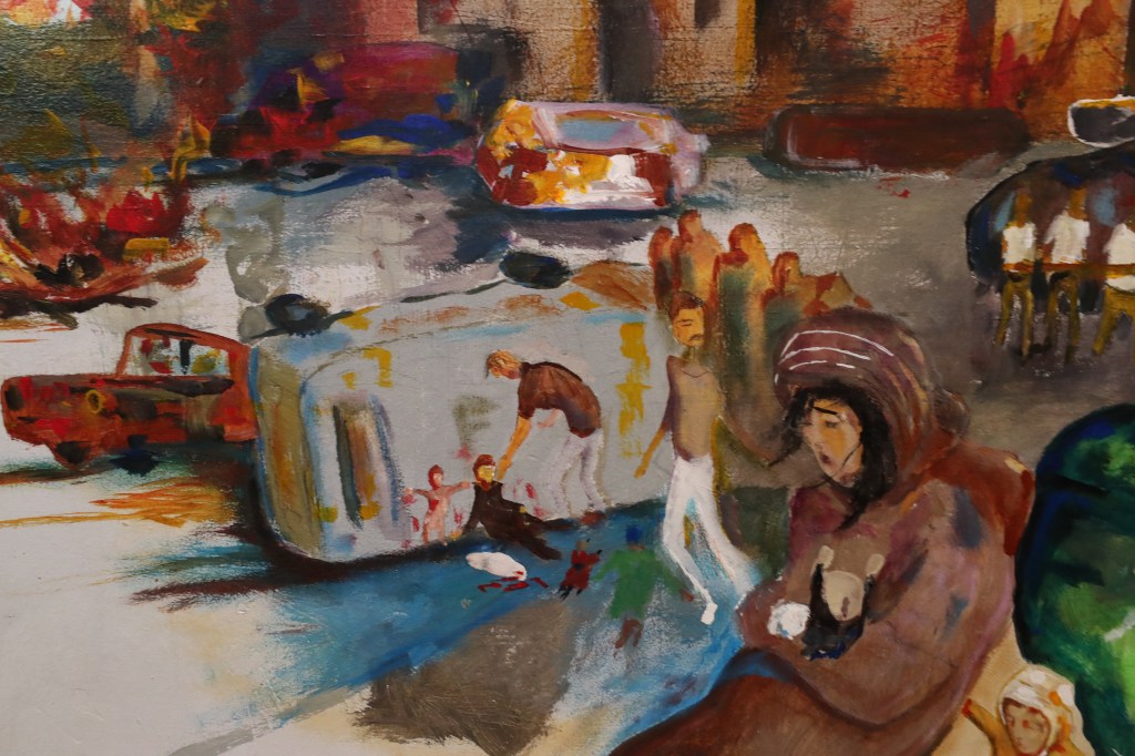 Wounded and killed people painted in the restaurant's mural.