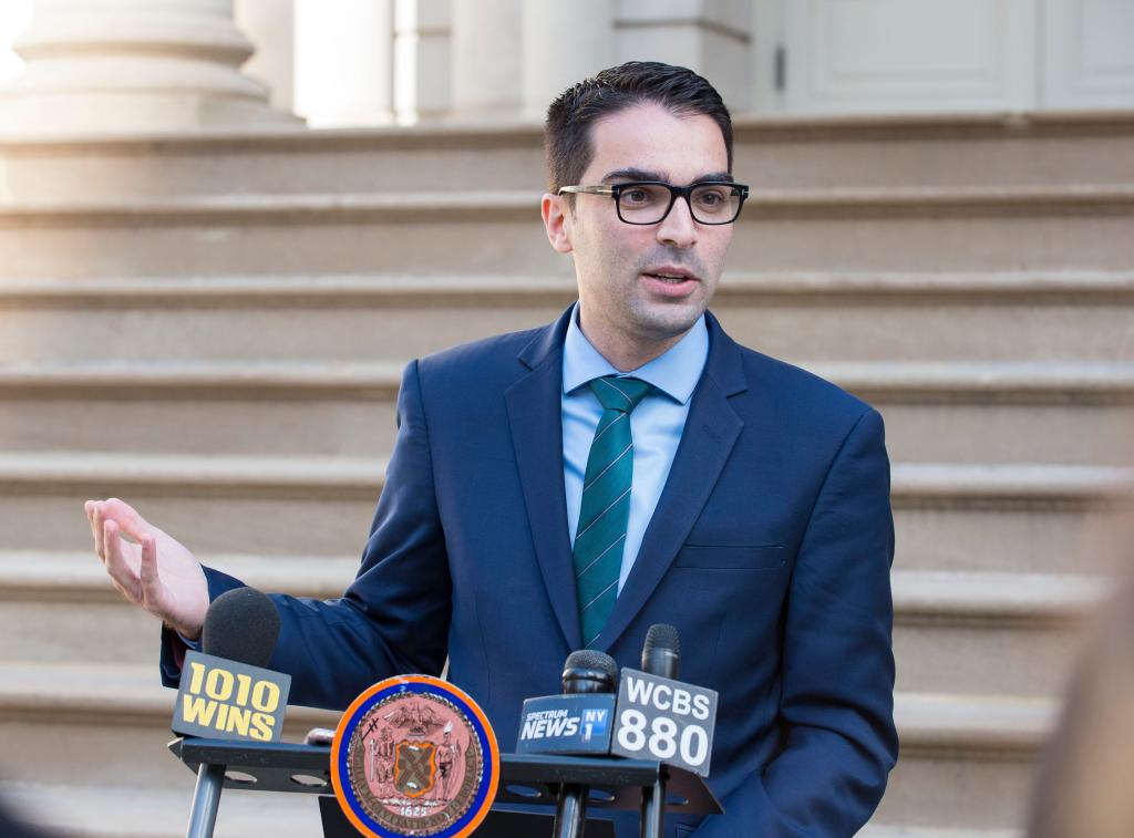 NYC Councilman Eric Ulrich speaking at a press conference on City Hall steps, introducing legislation related to Christopher Columbus statue