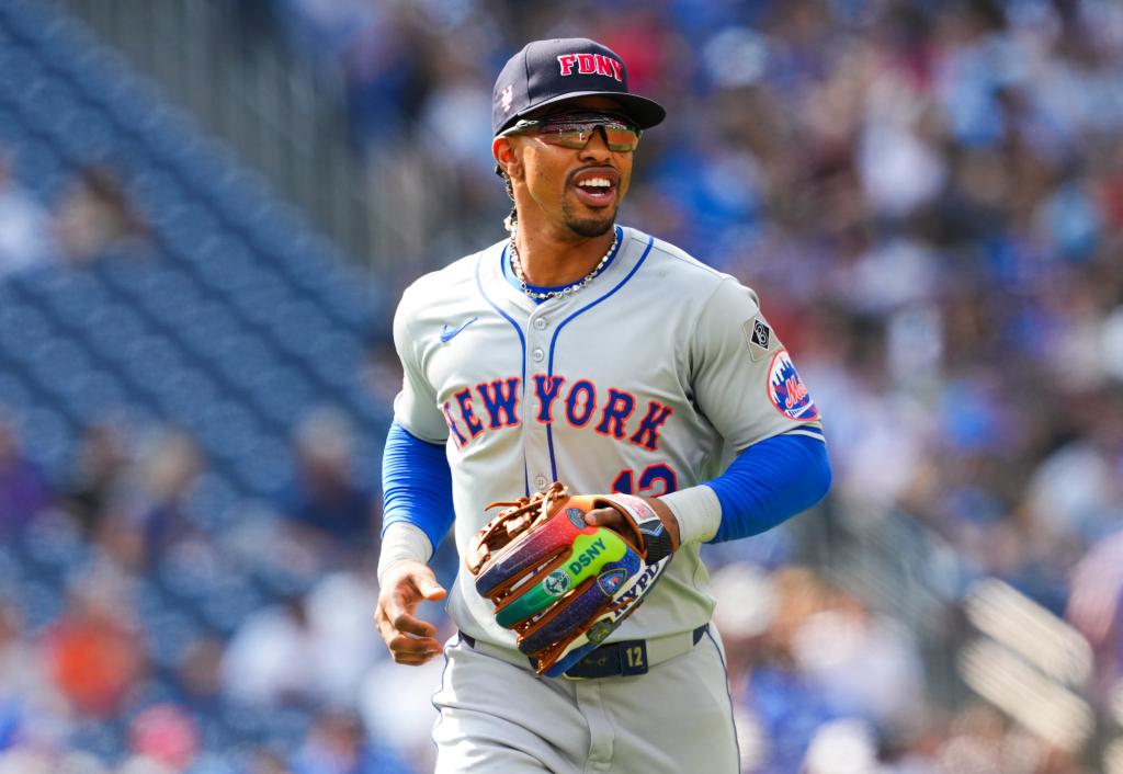 Francisco Lindor #12 of the New York Mets wears a hat to commemorate first responders on the anniversary off 9/11 while playing the Toronto Blue Jays in their MLB game at the Rogers Centre on September 11, 2024 in Toronto, Ontario, Canada