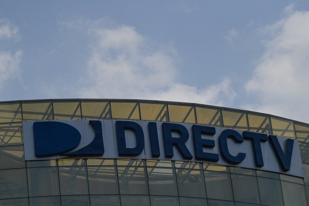 A DirecTV sign above its headquarters in Caracas.