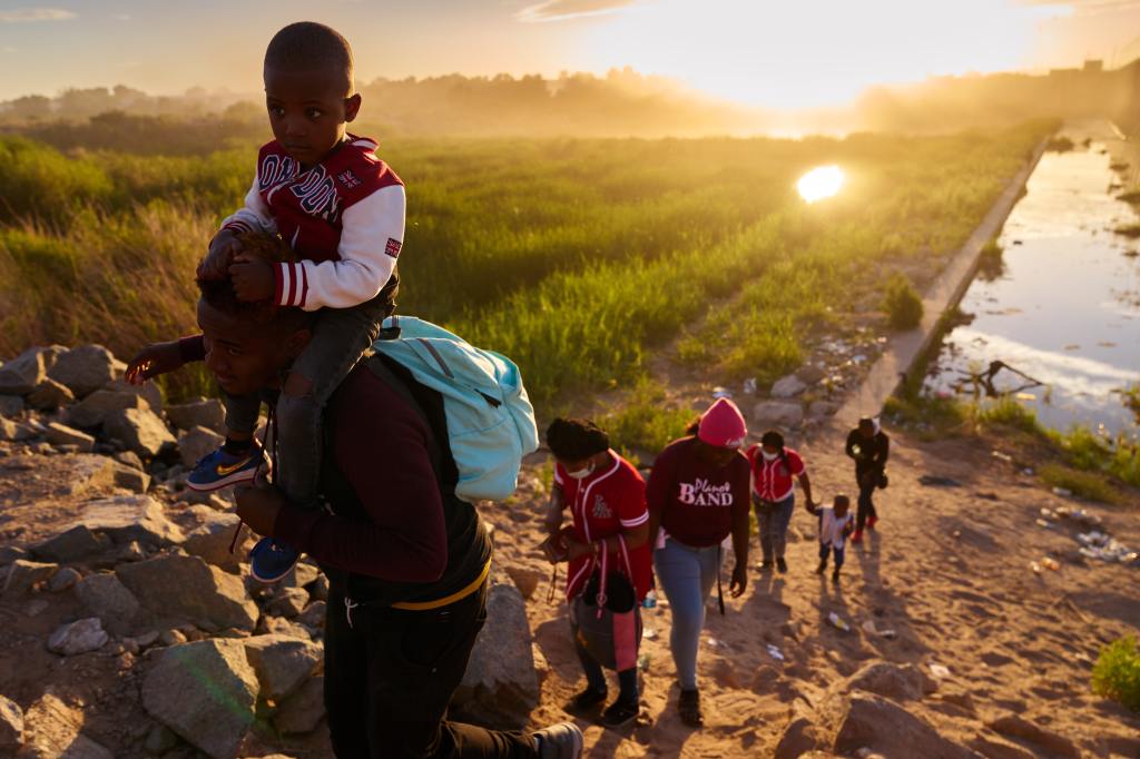 Migrants from Chile cross into Yuma, Arizona