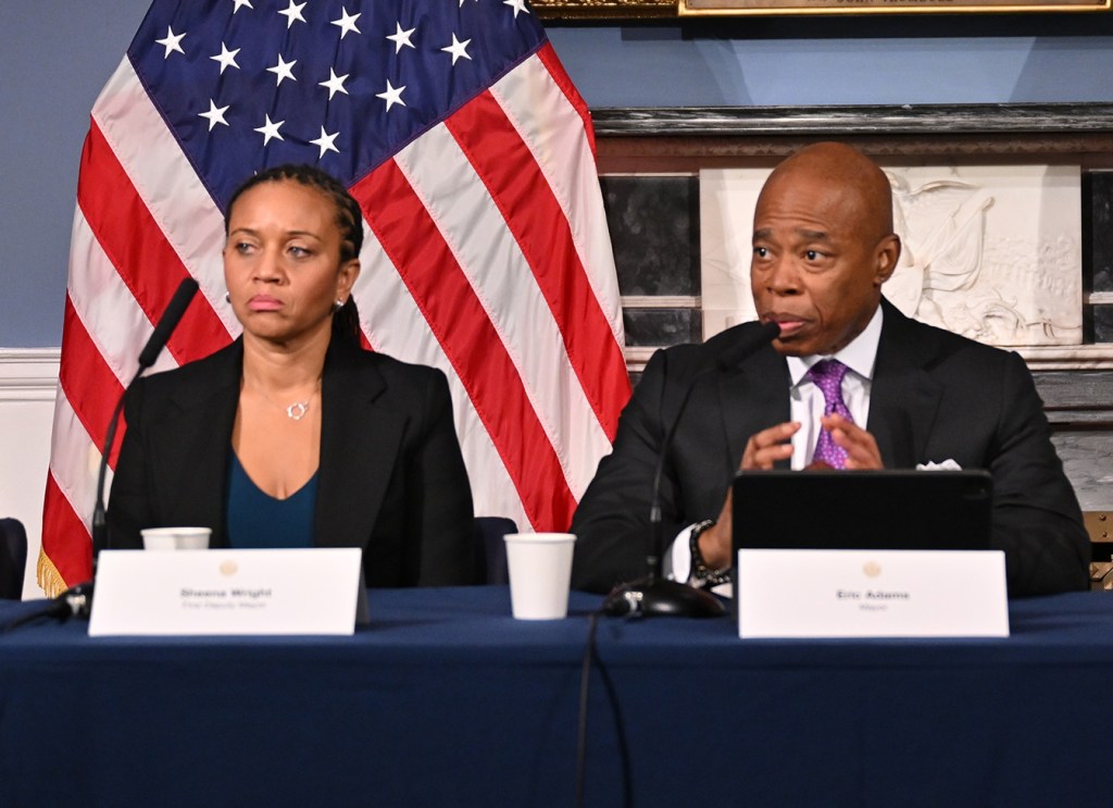 NYC Mayor Eric Adams facing media grilling alongside city officials at a press conference, November 8, 2023