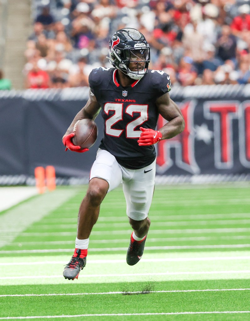 Houston Texans running back Cam Akers (22) rushes against the Los Angeles Rams in the first quarter at NRG Stadium.