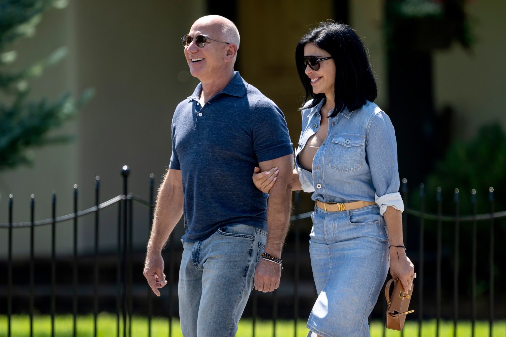 Bezos, the world's second richest person with a net worth valued by Bloomberg Billionaires Index at $202 billion as of Sunday, is seen with fiancée Lauren Sánchez.