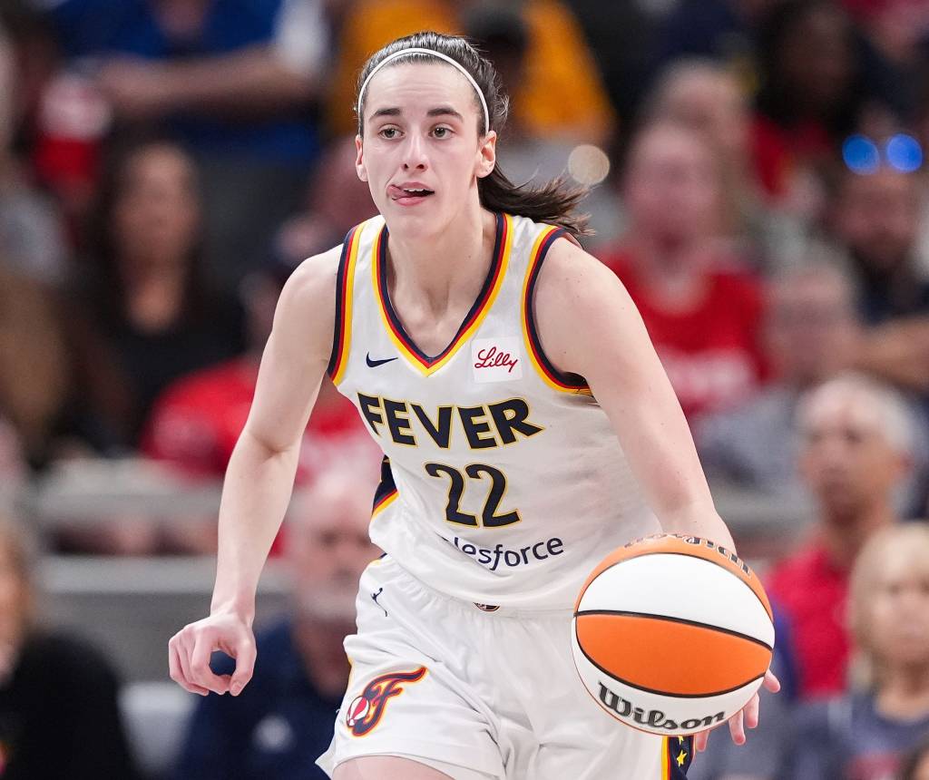 Indiana Fever guard Caitlin Clark (22) rushes up the court Friday, July 12, 2024, during the game at Gainbridge Fieldhouse in Indianapolis. 