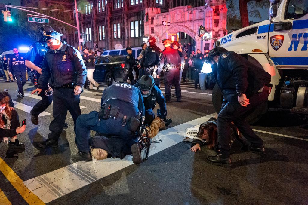 Police arrest protesters during pro-Palestinian demonstrations at The City College Of New York CUNY as the NYPD cracks down on protest camps at college campuses on April 30, 2024.