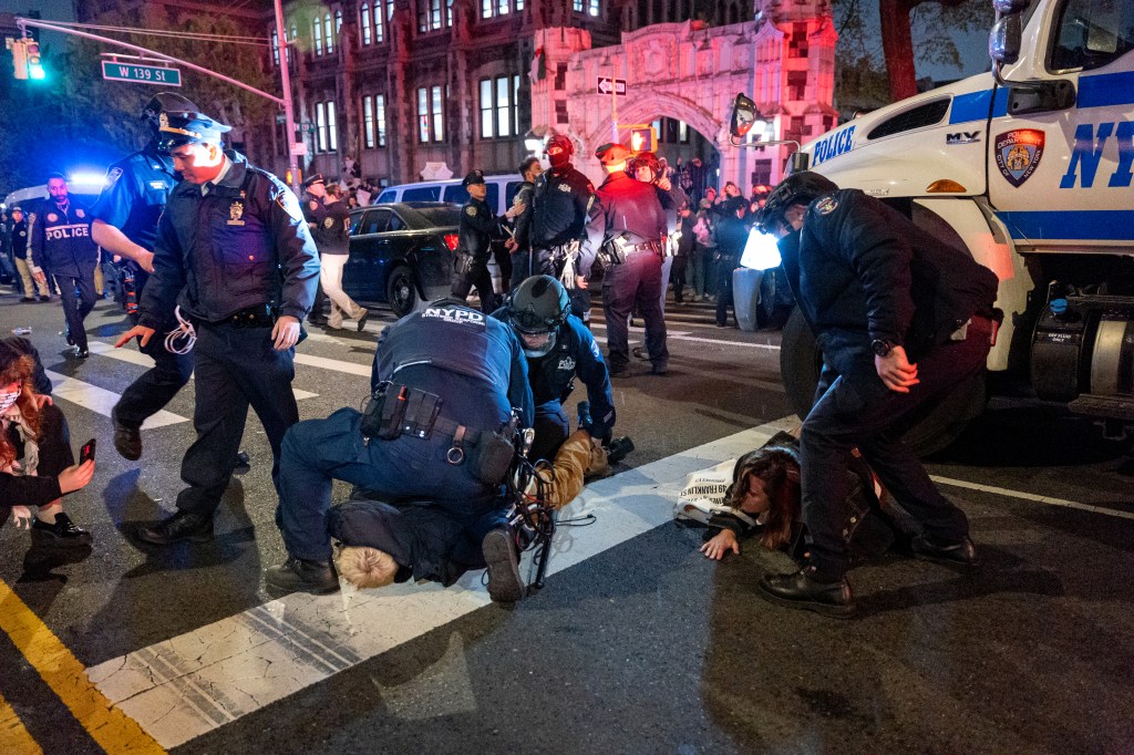 Police arrest protesters during pro-Palestinian demonstrations at The City College Of New York CUNY as the NYPD cracks down on protest camps at college campuses on April 30, 2024.
