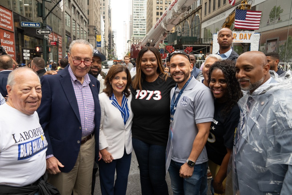 Governor Kathy Hochul posed with people during the 2024 New York City Labor Day Parade.