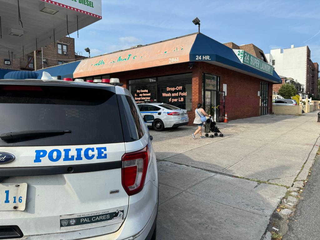 An unidentified female laundromat employee was stabbed by a customer Monday