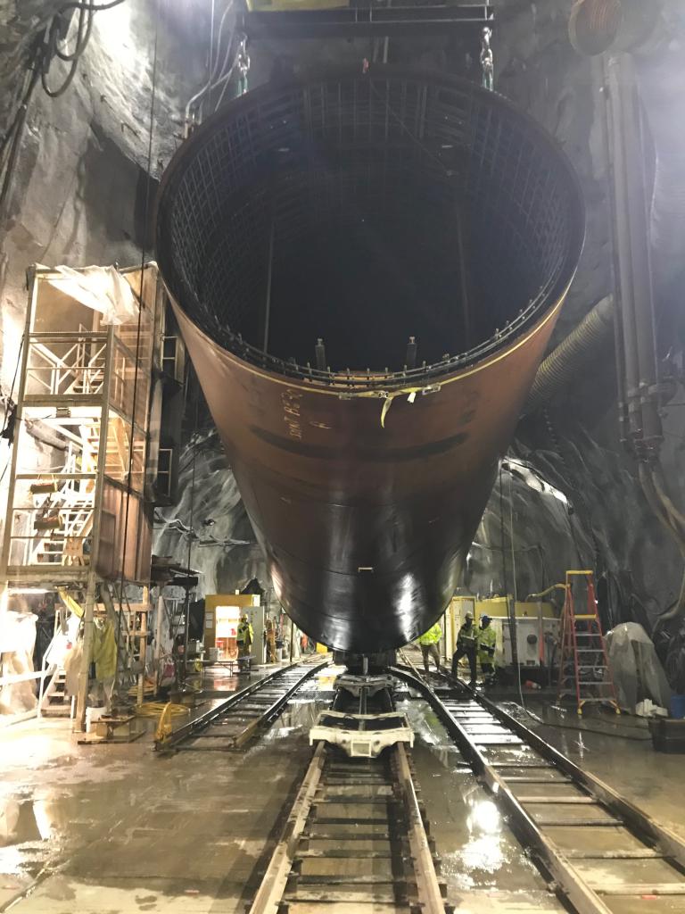 A large pipe in a tunnel, part of the Delaware Aqueduct, being shut down for repairs to address massive leaks beneath the Hudson River