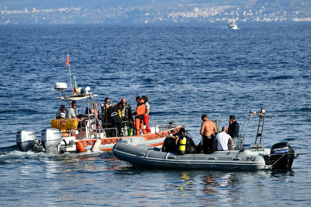 Rescue teams off the coast of Porticello, Sicily, searching for the last missing person after the British-flagged yacht Bayesian, owned by tech tycoon Mike Lynch, sank due to severe weather.