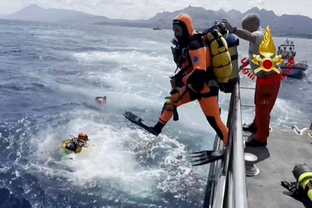 Divers from the Italian Corps of Firefighters investigating the sinking site of the British-flagged Bayesian yacht off Porticello, Sicily