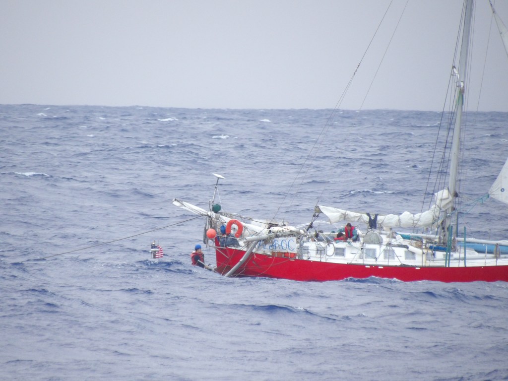 The sailboat, a 47-foot French-flagged vessel named Albroc, was first spotted by the Hercules plane. When it was within range, it picked up the 47-year-old woman’s mayday call. 