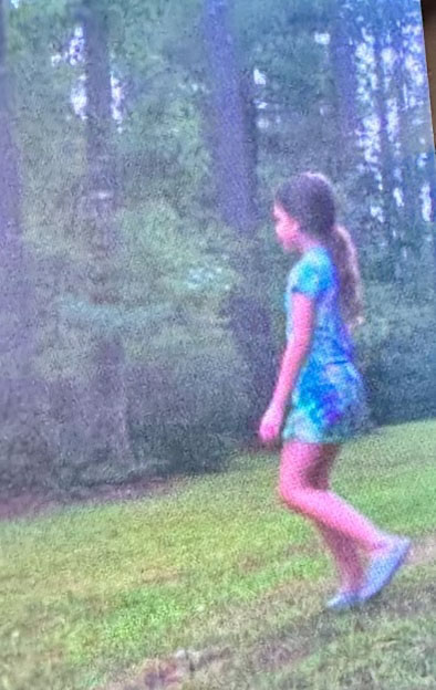 An image of Peyton Saintignan taking on a trial camera after she vanished.