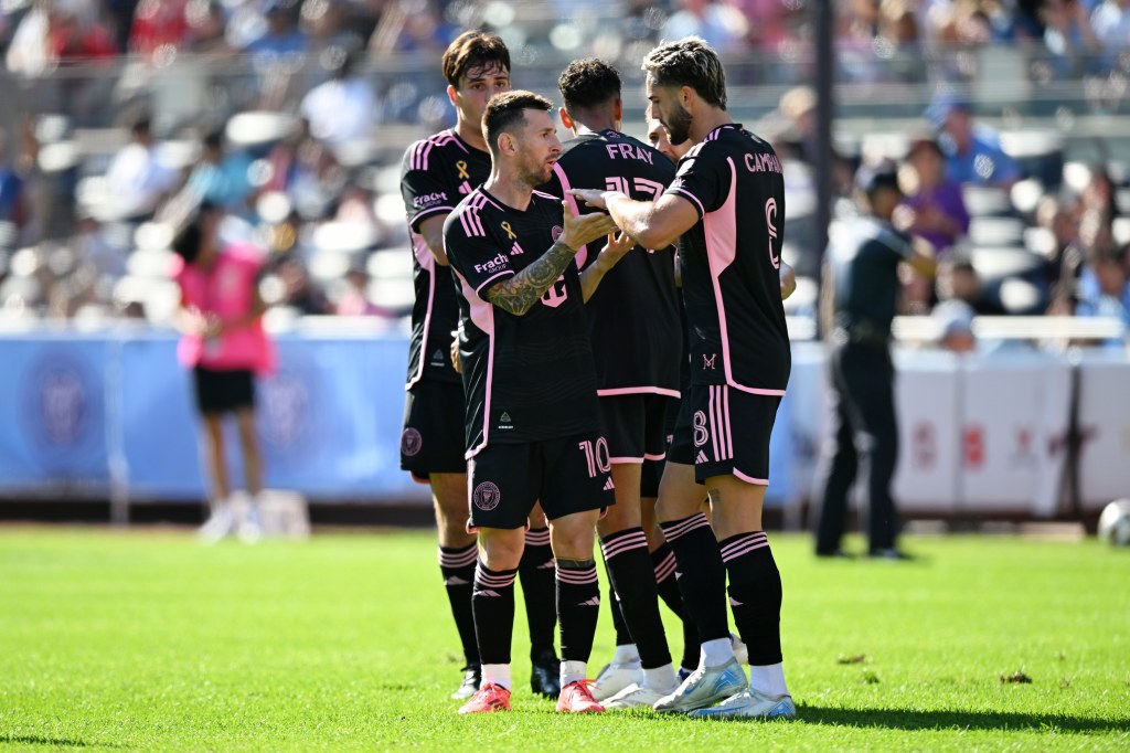 Inter Miami CF forward Leo Campana (8) is congratulated by forward Lionel Messi (10) after scoring a goal against New York City FC during the second half at Yankee Stadium. 