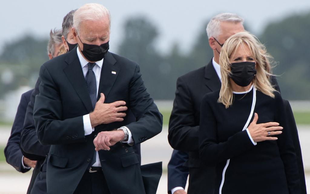 Biden sparked a furor among Gold Star families after he was photographed looking at his watch during the ceremony.