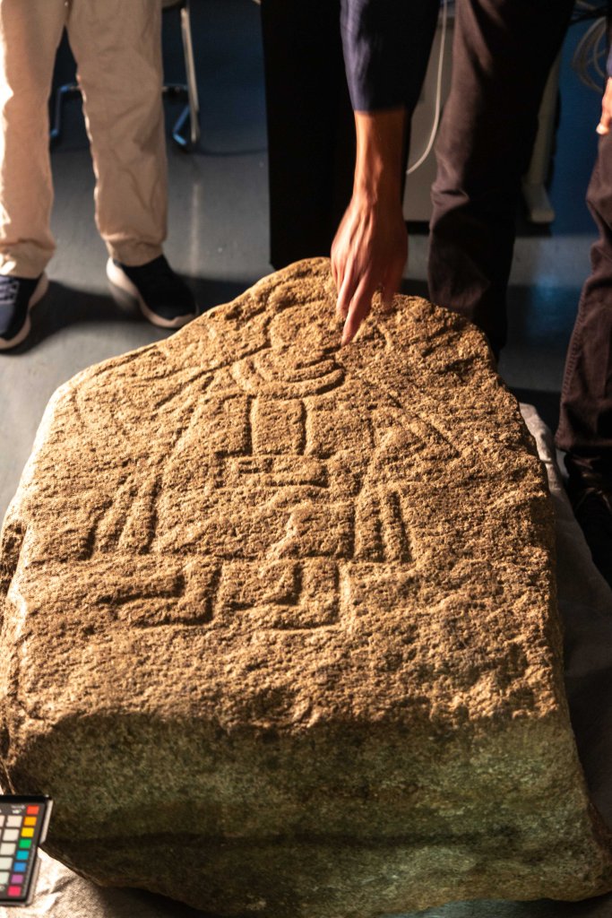 A boulder with a Christian carving on it from the 12th century was discovered in Germany under a man's home.