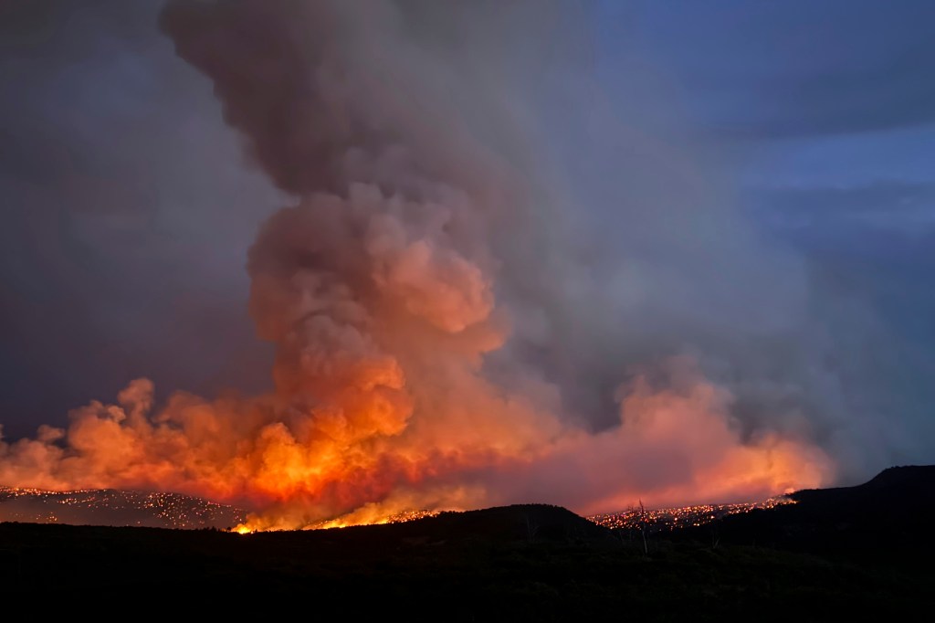 Undated photo of the Bucktail Fire burning in the mountains of western Colorado, provided by the Telluride Fire Protection District