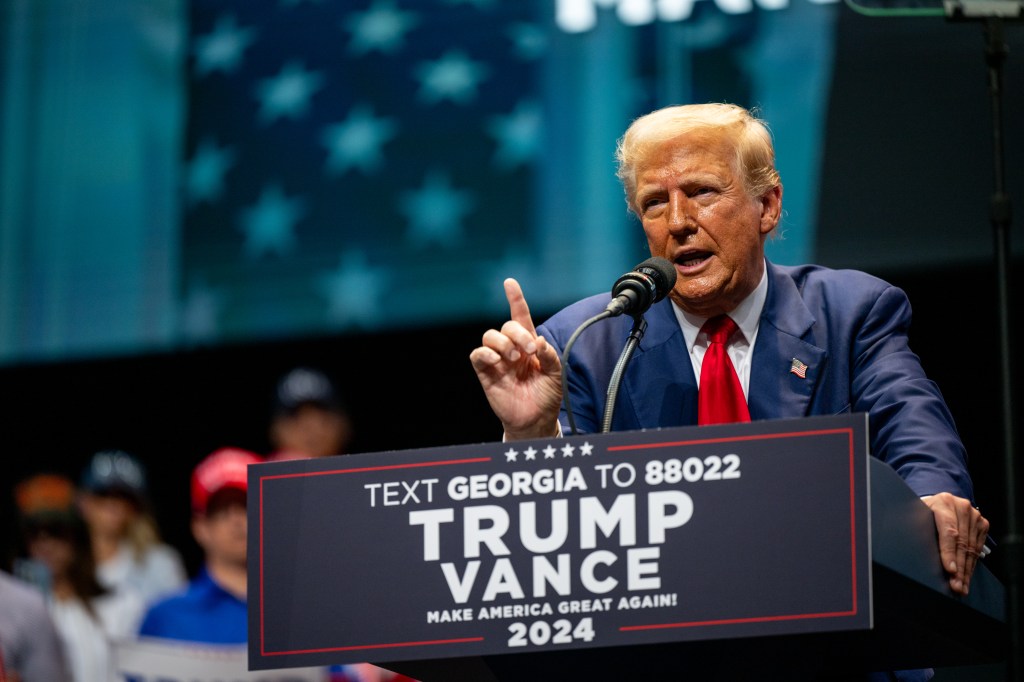 Former President Donald Trump speaking at a campaign rally in Johnny Mercer Theatre, Savannah, Georgia about the economy