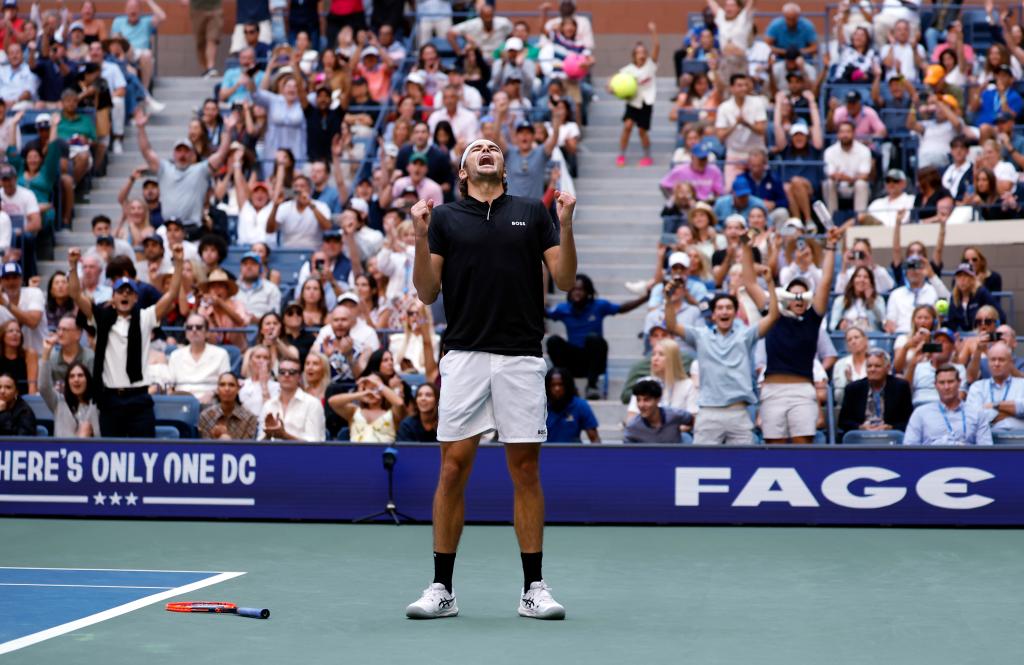 Taylor Fritz (USA) [12] reacts after defeating Alexander Zverev (GER) [4] at the end of their match on Arthur Ashe Stadium.