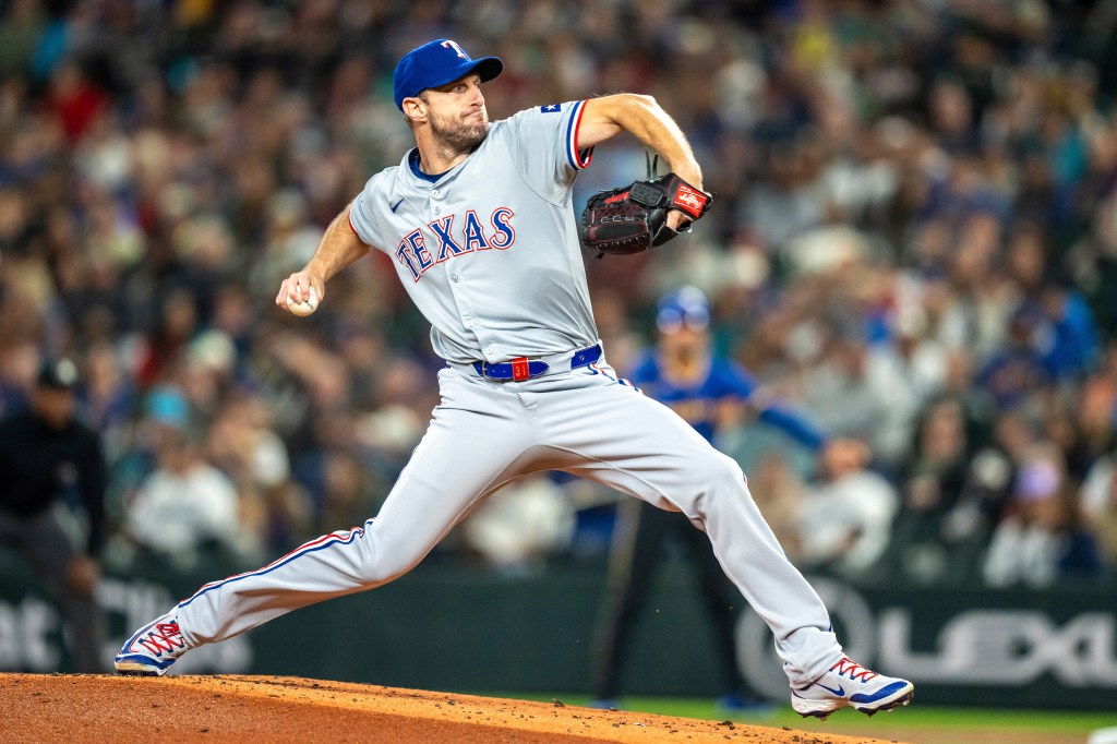 
Texas Rangers starter Max Scherzer delivers a pitch during the first inning of a baseball game against the Texas Rangers, Saturday, Sept. 14, 2024, in Seattle.