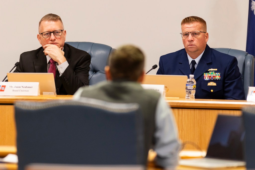 Tony Nissan, head engineer for OceanGate, testifies before Coast Guard's Jason Neubauer, left, and Thomas Whalen, right, during the Titan marine board formal hearing inside the Charleston County Council Chambers Monday, Sept. 16, 2024, in North Charleston, S.C.