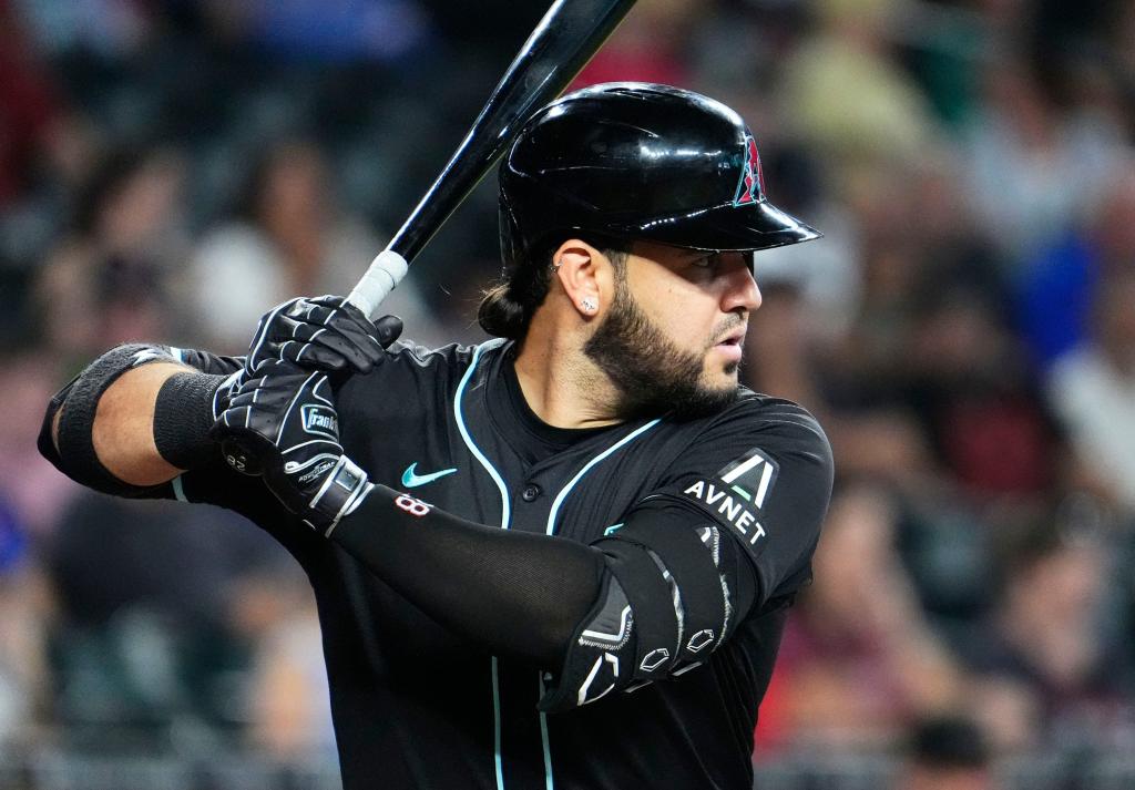 Arizona Diamondbacks Eugenio Suarez (28) bats against the New York Mets in the second inning at Chase Field in Phoenix on Aug. 29, 2024.