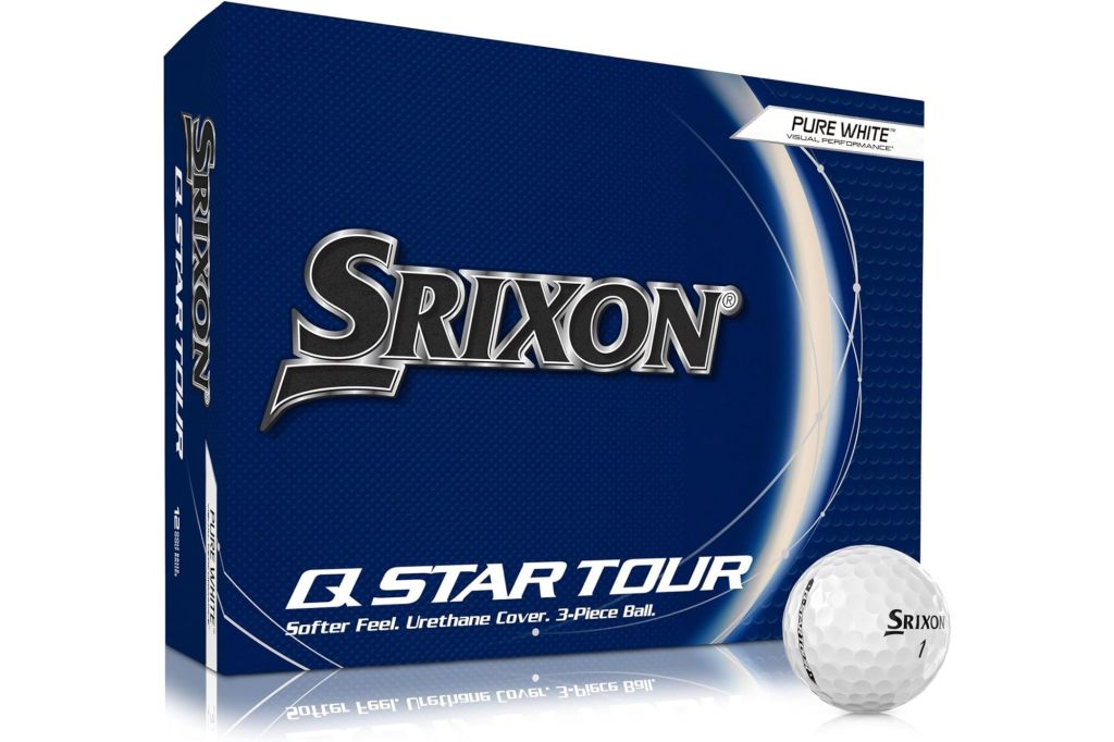 A box of golf balls with a ball outside the box.