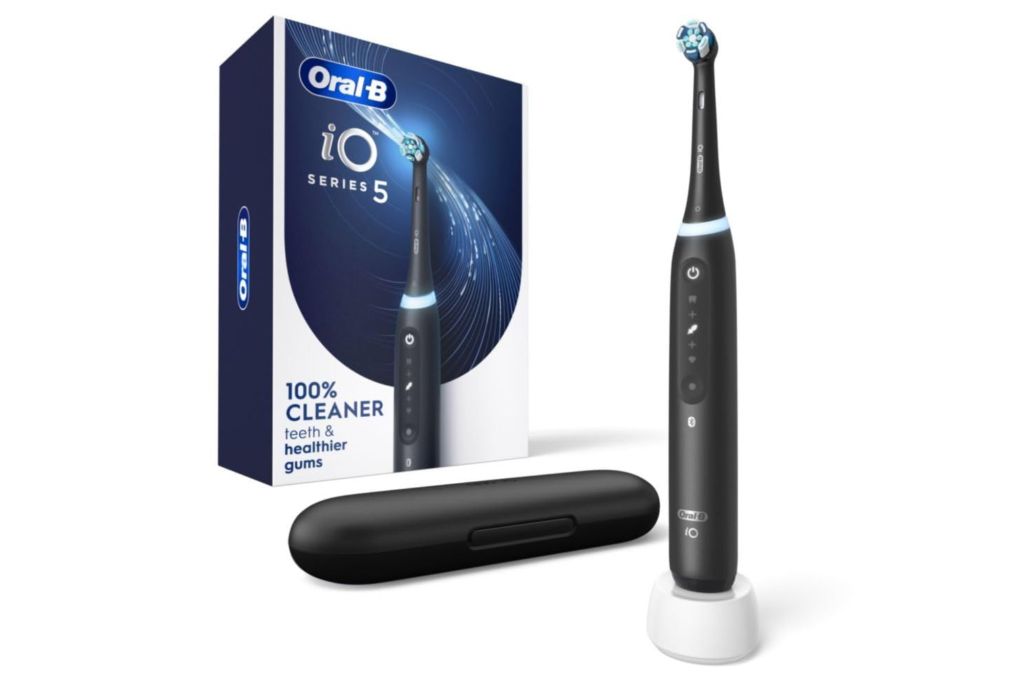 An iO Oral-B Electric toothbrush, a case and box.