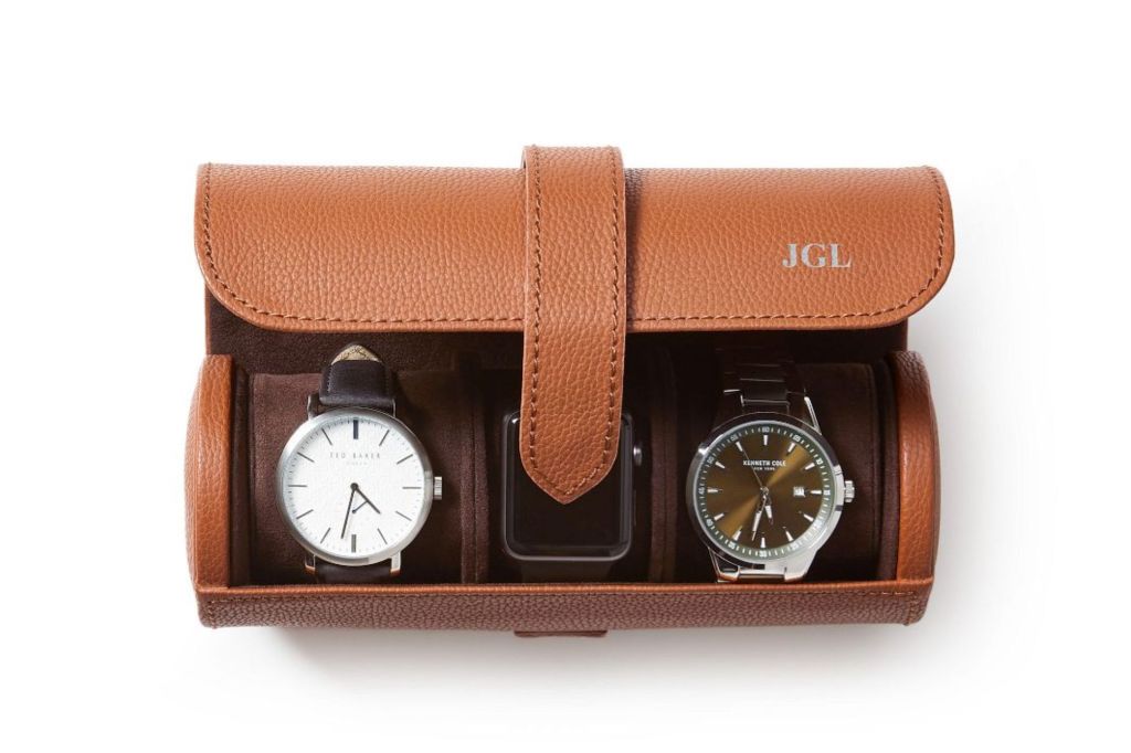 A leather travel watch roll