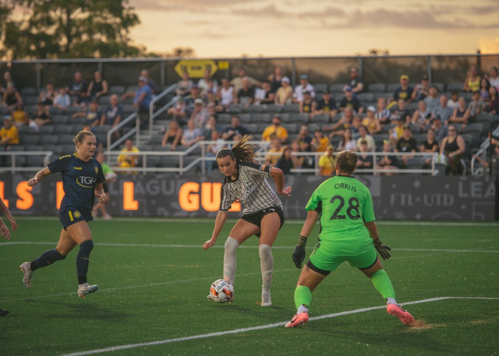 Isabel Cox (13) in action for Brooklyn FC women's team.
