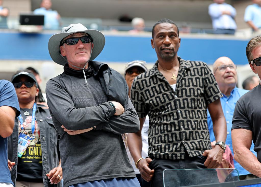 Actor Leon Robinson and coach Brad Gilbert as Coco Gauff (USA) [3] defeats Elina Svitolina (UKR) [27] in their 3 round match on Arthur Ashe Stadium during day 5 of the 2024 US Open Championship. 