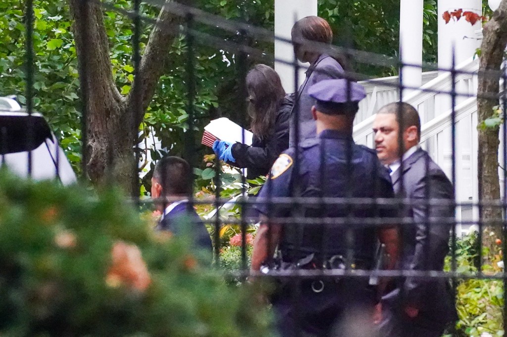 Federal agents removing documents from Gracie Mansion during a raid on Sept. 26, 2024.