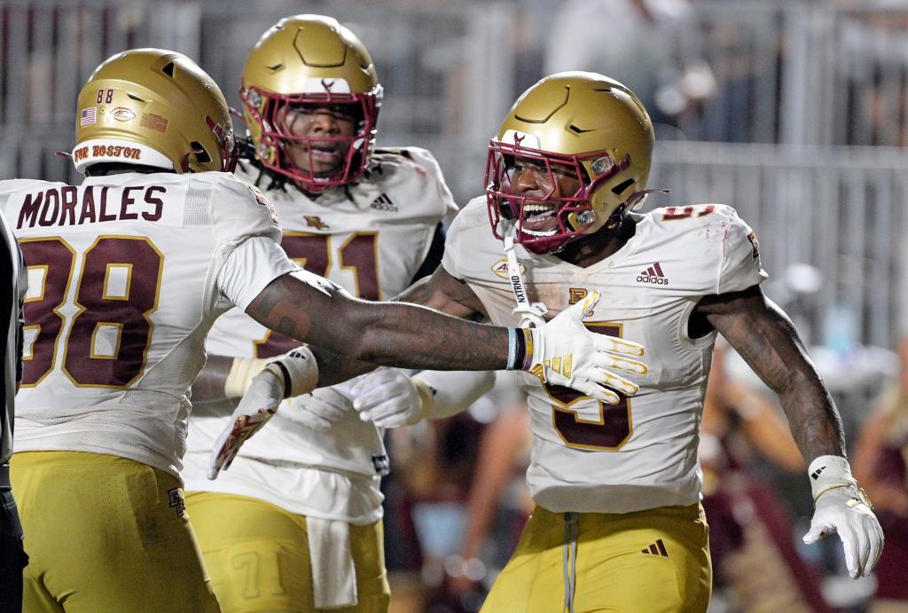 Eagles running back Kye Robichaux (5) celebrates a touchdown during the second half against the Florida State Seminoles at Doak S. Campbell Stadium. 