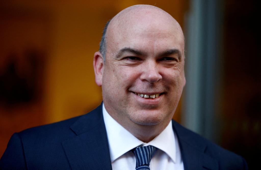 British entrepreneur Mike Lynch in a suit and tie leaving the High Court in London, Britain on March 25, 2019