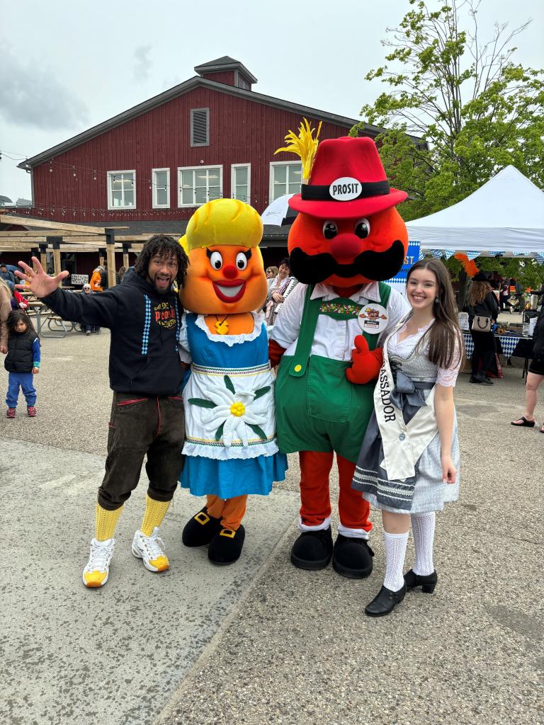 Oktoberfest Ambassadors, including President Allan Cayenne, Allie Steffler, Onkel Hans and Tante Frieda in traditional German outfits at Canada Oktoberfest