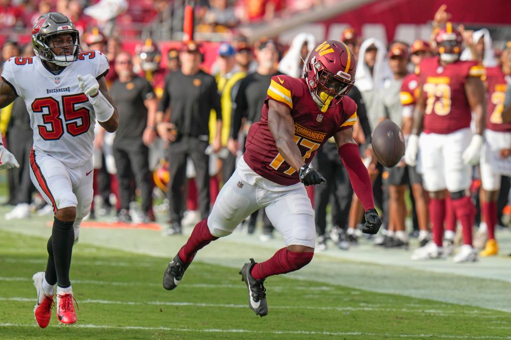 Commanders wide receiver Terry McLaurin (17) can't hang on to a pass in front of Tampa Bay Buccaneers cornerback Jamel Dean