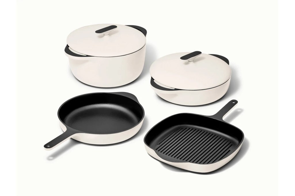 A group of white pots and pans