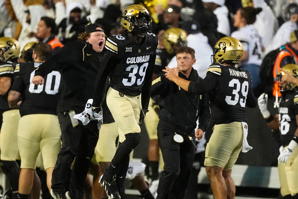 Colorado cornerback Ben Bouzi celebrates after an overtime win over Baylor on Sept. 21, 2024.