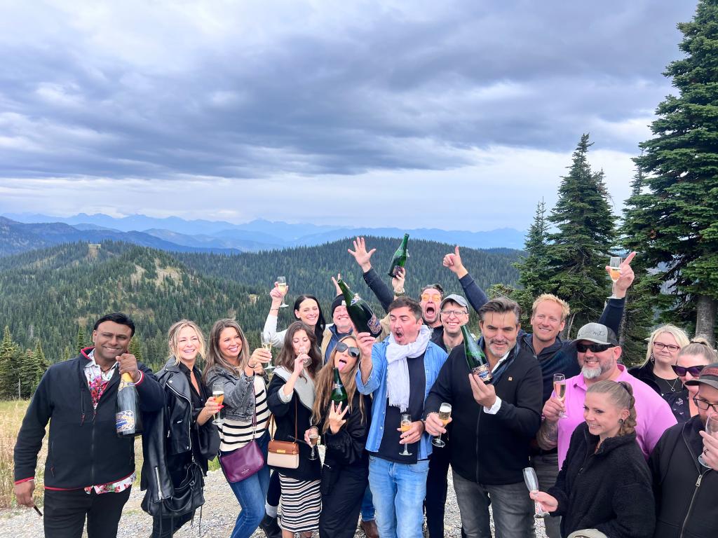 Guests pop champagne at the top of Big Mountain to close out the Whitefish Food & Wine Festival 